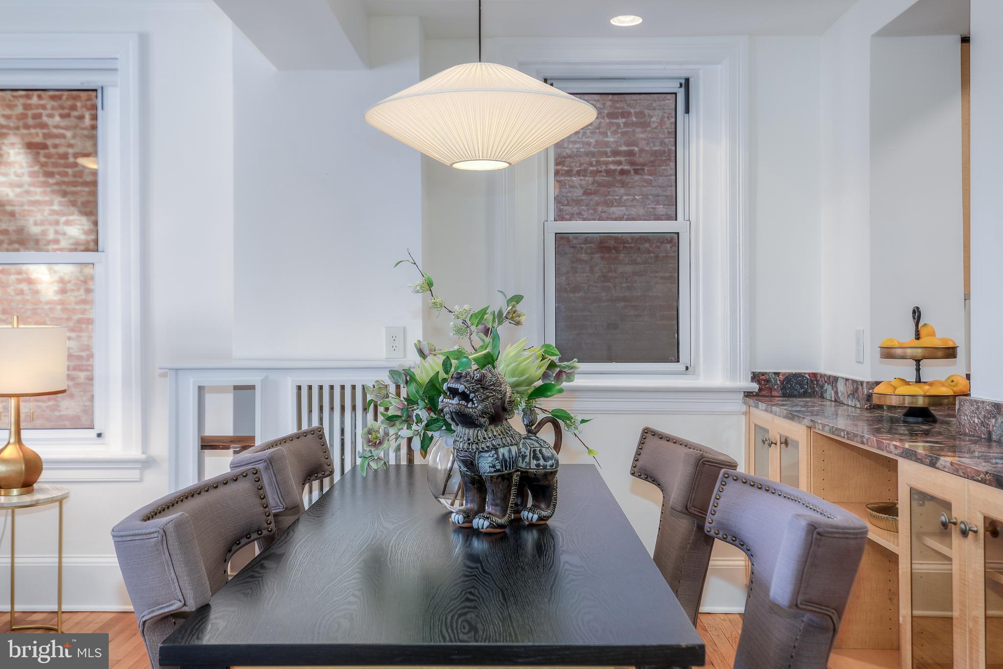 1954 Columbia Road Northwest, Unit 201 Washington, DC 20009 - Photo 13 of 41 Elegant dining space with natural light.