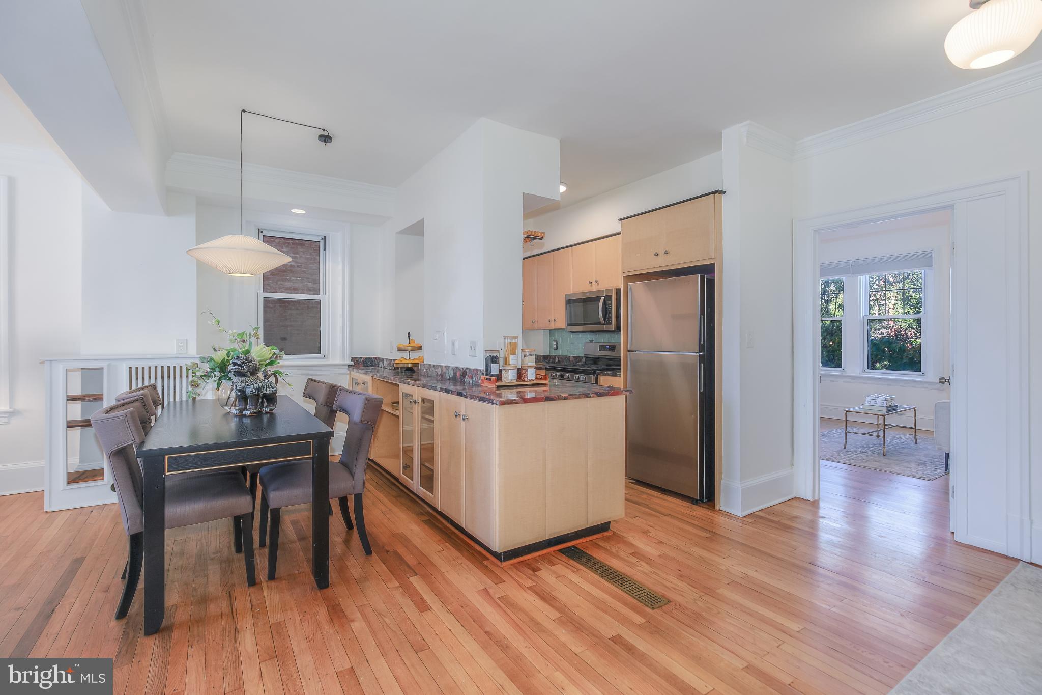 1954 Columbia Road Northwest, Unit 201 Washington, DC 20009 - Photo 14 of 41 Modern kitchen with open layout charm.
