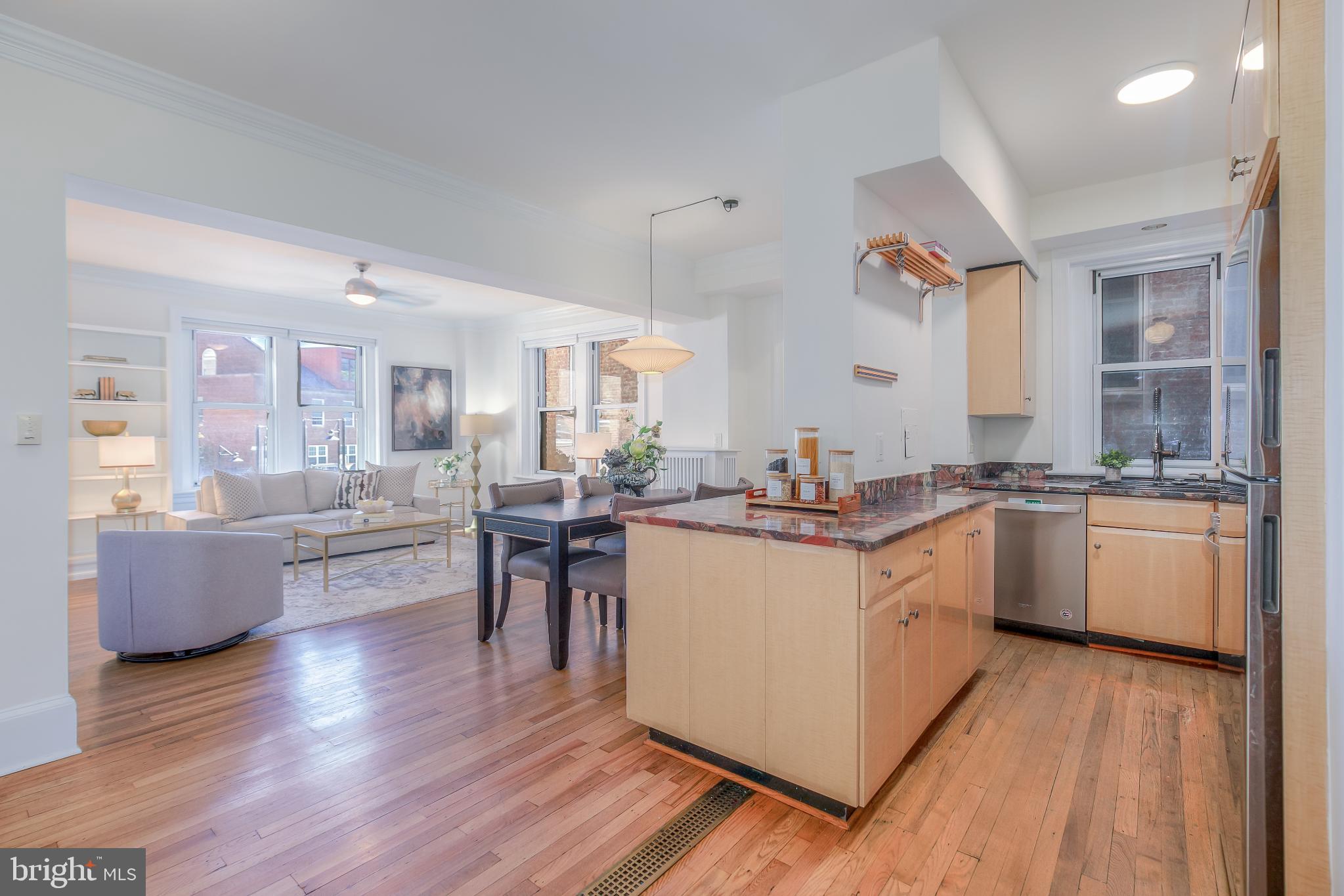 1954 Columbia Road Northwest, Unit 201 Washington, DC 20009 - Photo 18 of 41 Bright and airy open-concept living space.