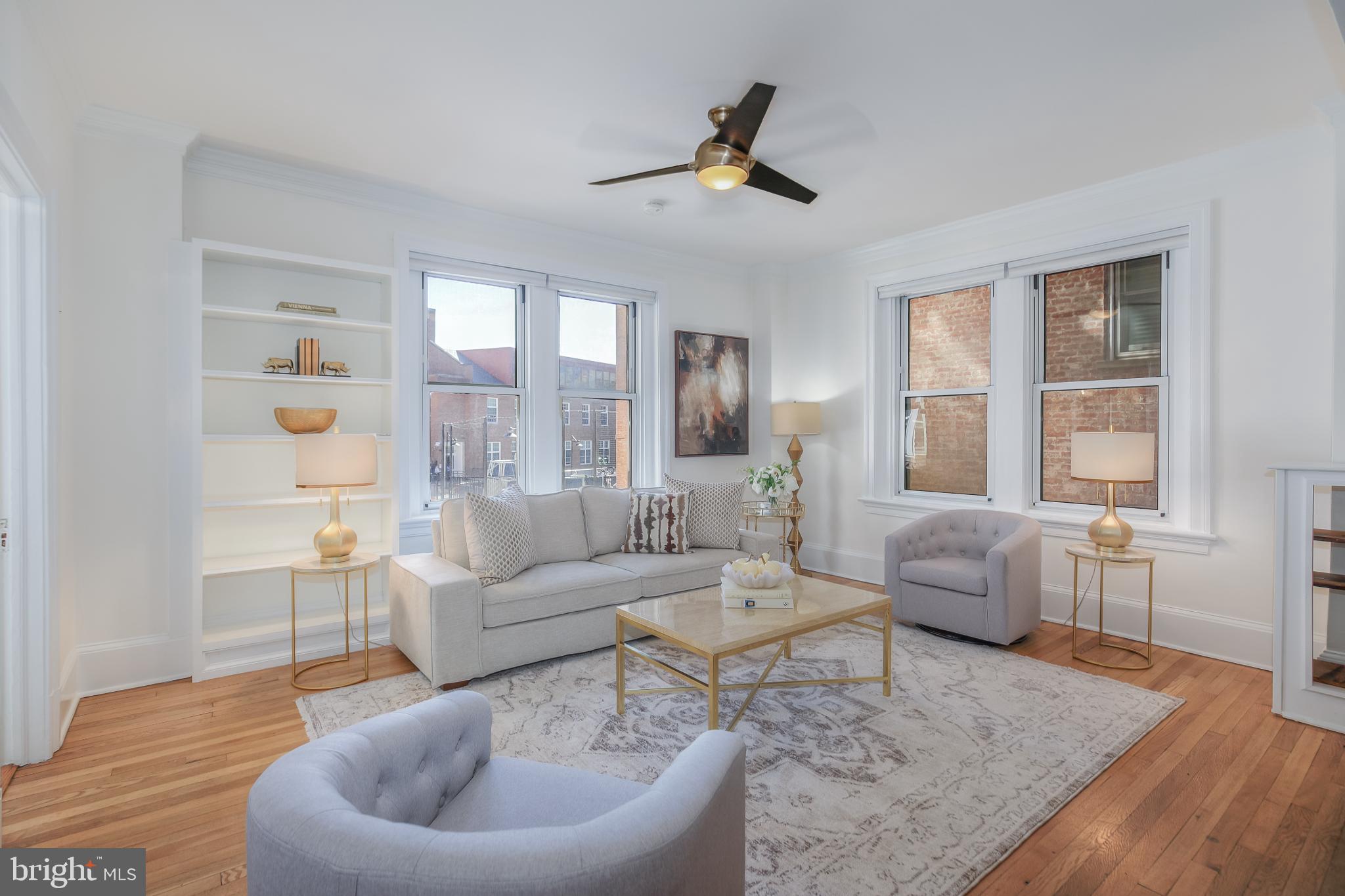 1954 Columbia Road Northwest, Unit 201 Washington, DC 20009 - Photo 7 of 41 Light and bright living area faces east