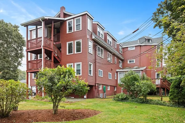 a front view of a multi story residential apartment buildings