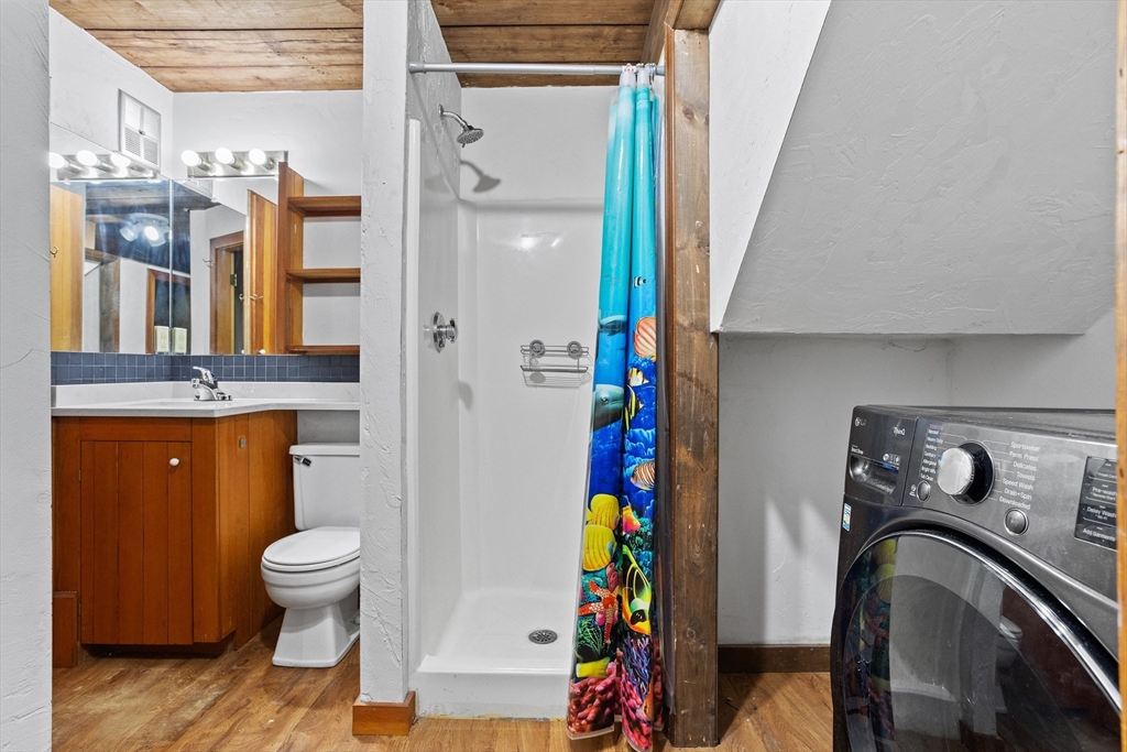 16 Middlesex Street, Unit 4 Chelmsford, MA 01863 - Photo 22 of 25 a bathroom with a sink toilet and shower