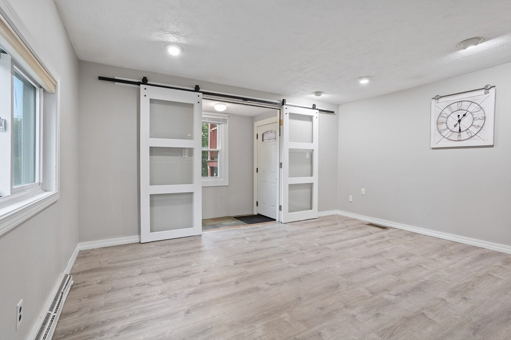 16 Middlesex Street, Unit 4 Chelmsford, MA 01863 - Photo 5 of 25 a view of an empty room with a window