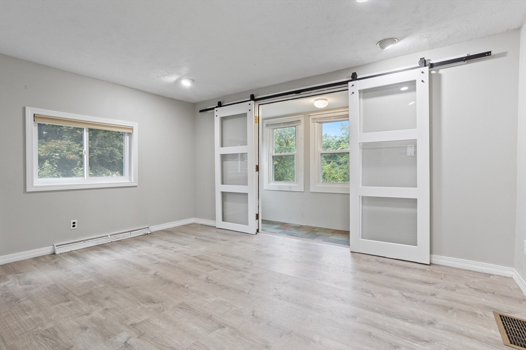 16 Middlesex Street, Unit 4 Chelmsford, MA 01863 - Photo 7 of 25 a view of an empty room with a window