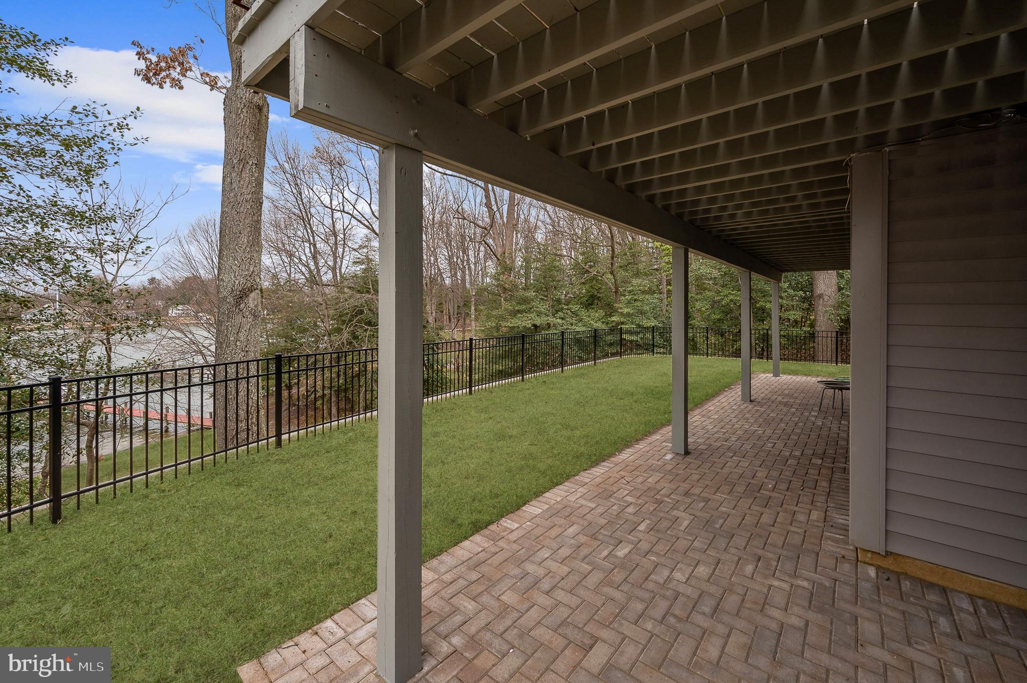 514 Edgewater Road Pasadena, MD 21122 - Photo 42 of 55 Patio and Fenced Section of Backyard