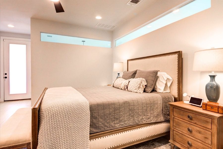 916 East 50th Street, Unit 1 Austin, TX 78751 - Photo 15 of 36 The primary bedroom also has access to a private balcony through the door on the left.