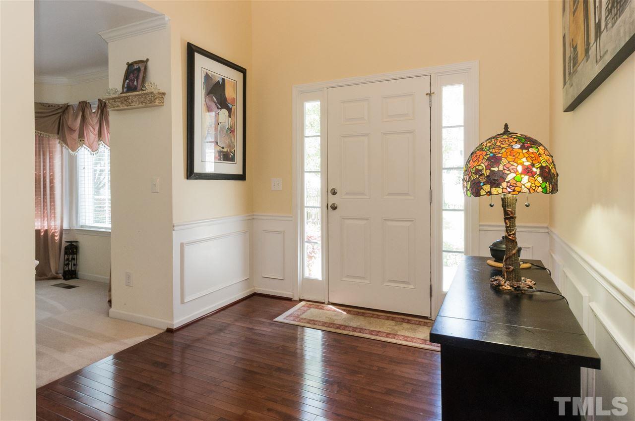 4809 Hodfield Court Raleigh, NC 27604 - Photo 3 of 22 a view of a livingroom with furniture and hardwood floor