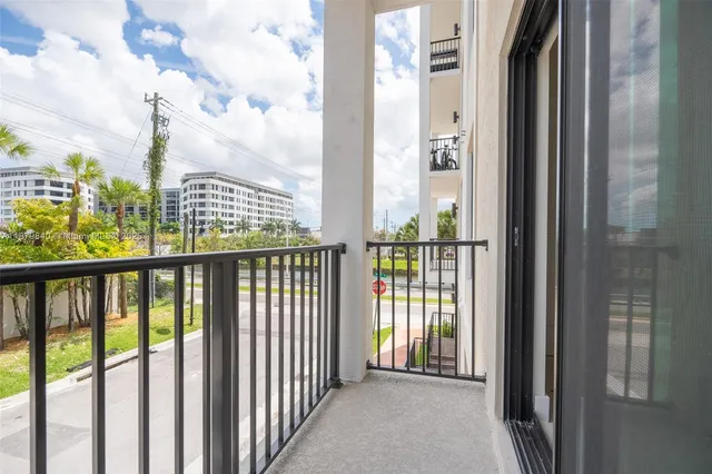 a view of a balcony with city view