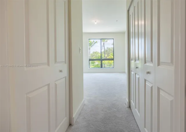 a view of a houses with a street