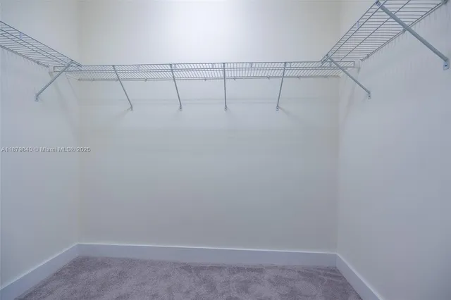 a view of a backyard with sitting area