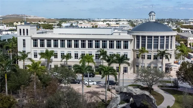 a view of a balcony with two chairs