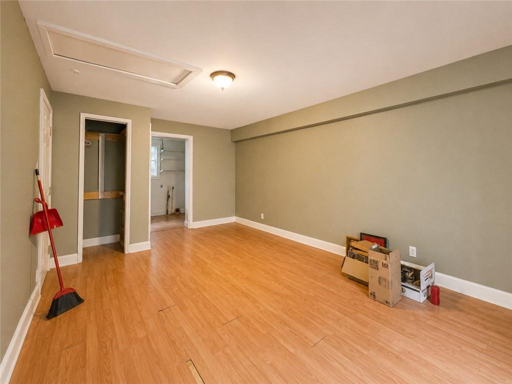212 Craigtown Road Northeast Calhoun, GA 30701 - Photo 14 of 21 a view of a room with wooden floor and white walls