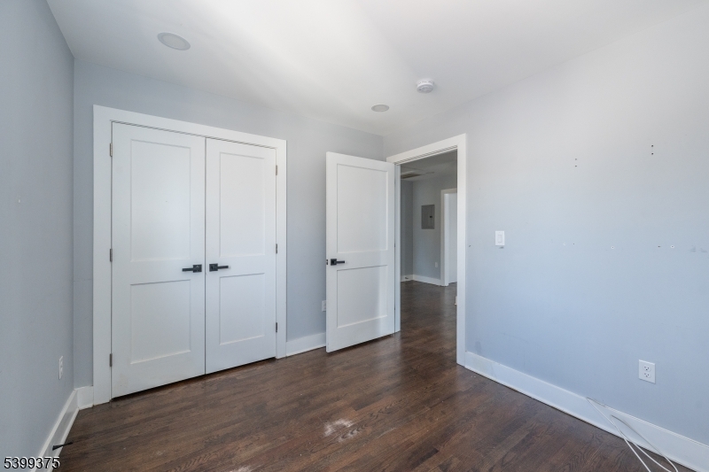17 Peachtree Road, Unit 2 Maplewood, NJ 07040 - Photo 10 of 14 a view of an empty room with wooden floor
