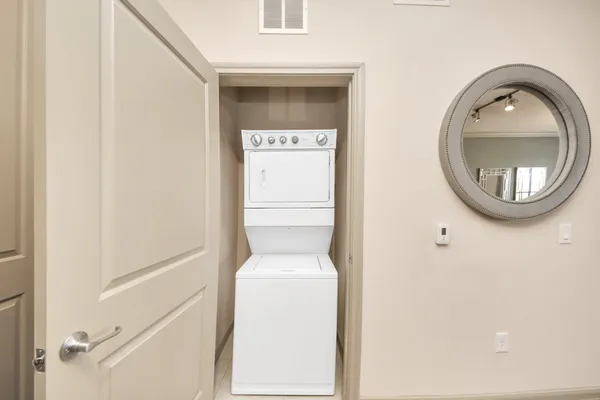 a bathroom with a tub and shower