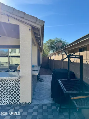 a kitchen with a sink a stove and a window