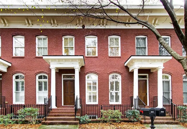 a front view of residential houses