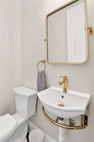 a bathroom with a sink and a toilet