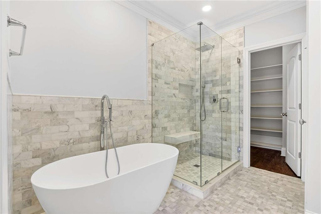 841 Inman Village Parkway Northeast Atlanta, GA 30307 - Photo 16 of 27 a bathroom with a bathtub and shower