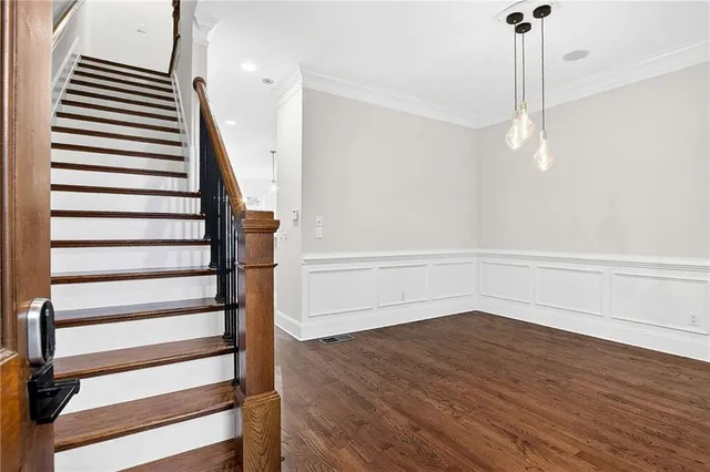 a view of entryway with wooden floor