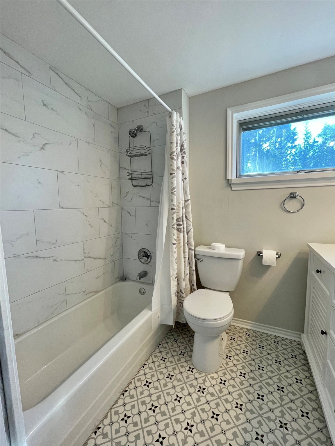 1112 Southampton Drive Angleton, TX 77515 - Photo 32 of 36 a white toilet sitting next to a bath tub and a shower