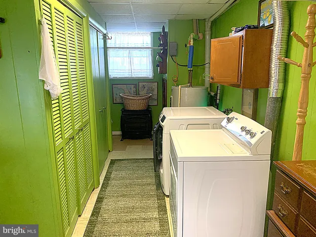 a front view of a house with parking space