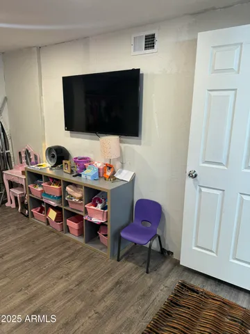 a bathroom with a sink a mirror and a toilet