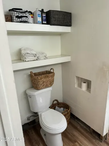 a bathroom with a sink double vanity and a mirror