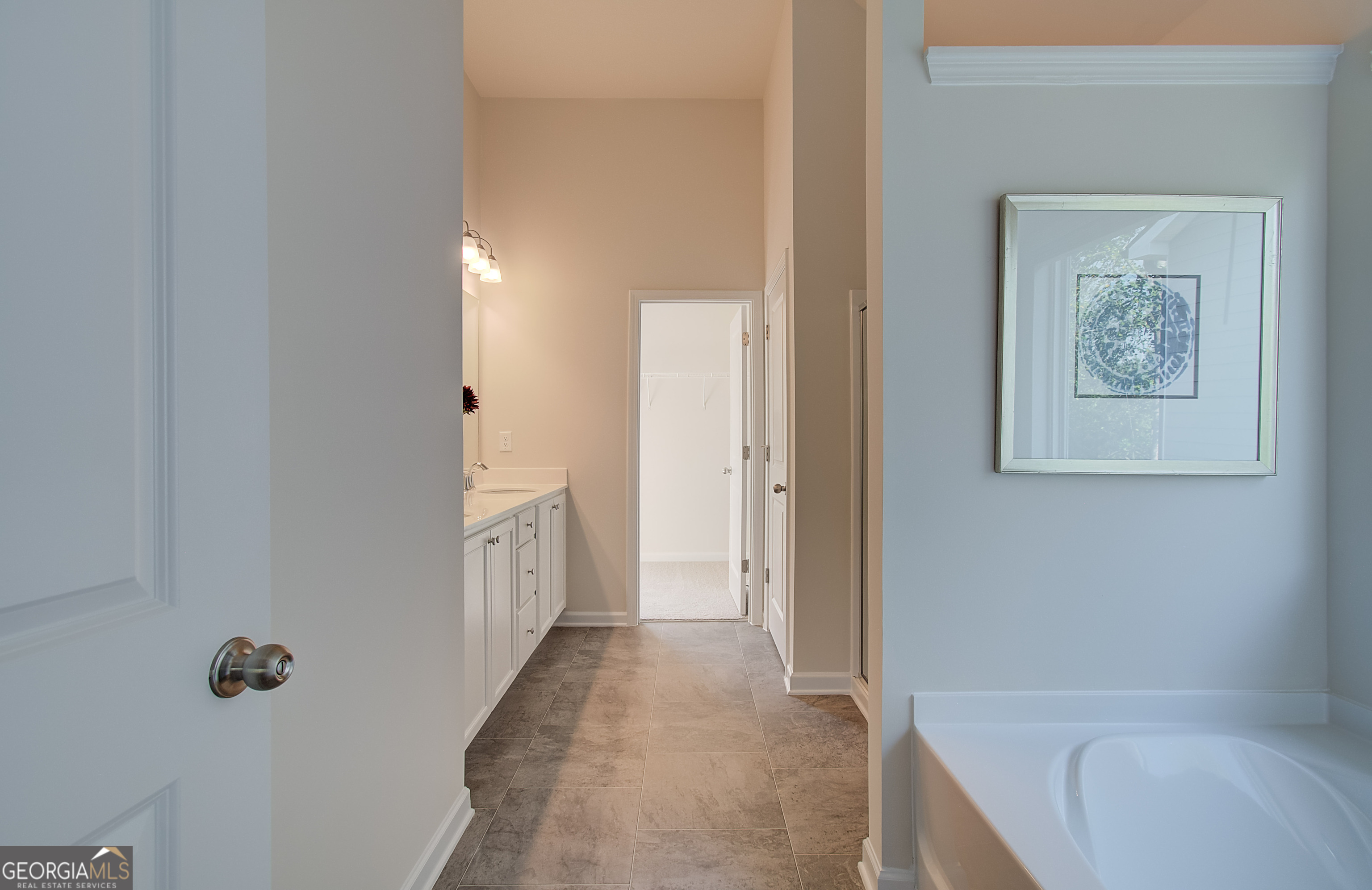 4581 Ajo Walk, Unit HOMESITE 22 Atlanta, GA 30331 - Photo 15 of 18 a bathroom with a bathtub and shower