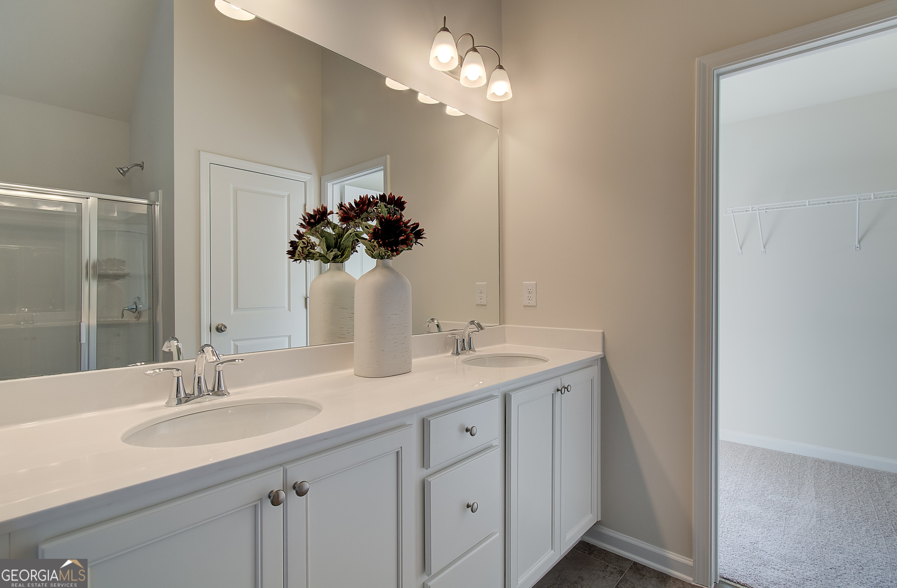 4581 Ajo Walk, Unit HOMESITE 22 Atlanta, GA 30331 - Photo 17 of 18 a bathroom with a sink vanity and a mirror