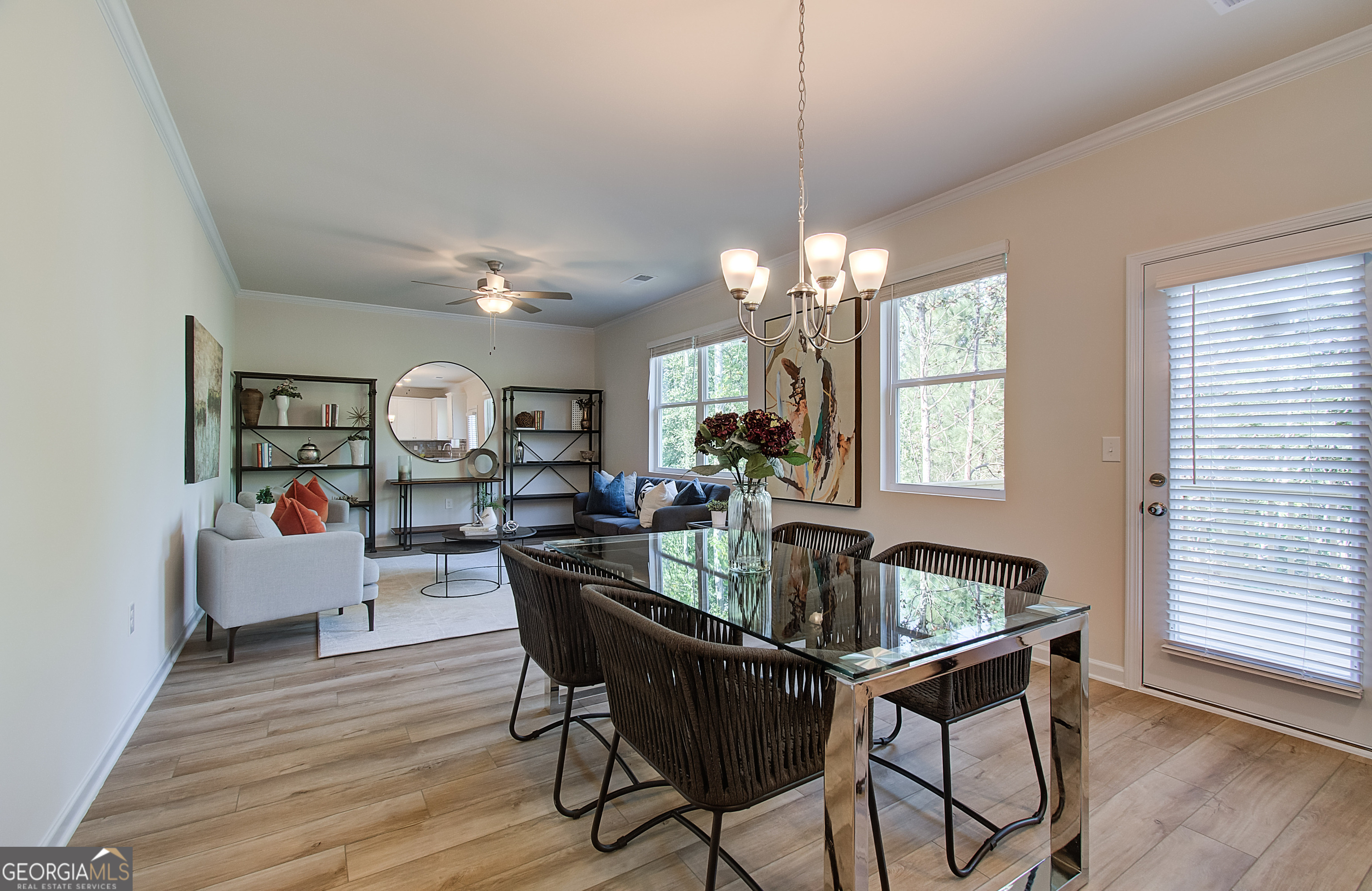 4581 Ajo Walk, Unit HOMESITE 22 Atlanta, GA 30331 - Photo 8 of 18 a view of a dining room with furniture and wooden floor
