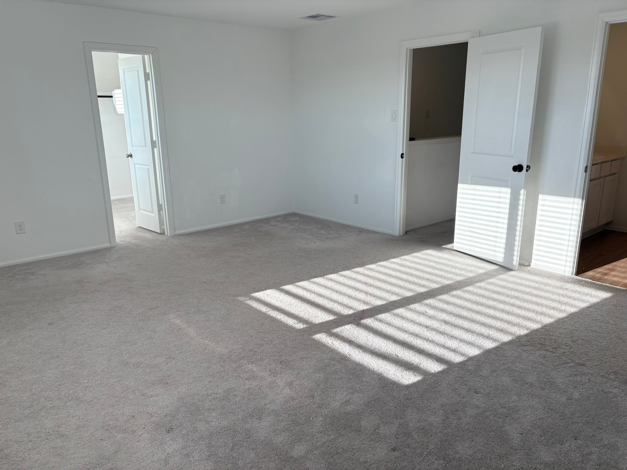 21911 Scopeto Lane New Caney, TX 77357 - Photo 9 of 14 a view of wooden floor and windows in a room