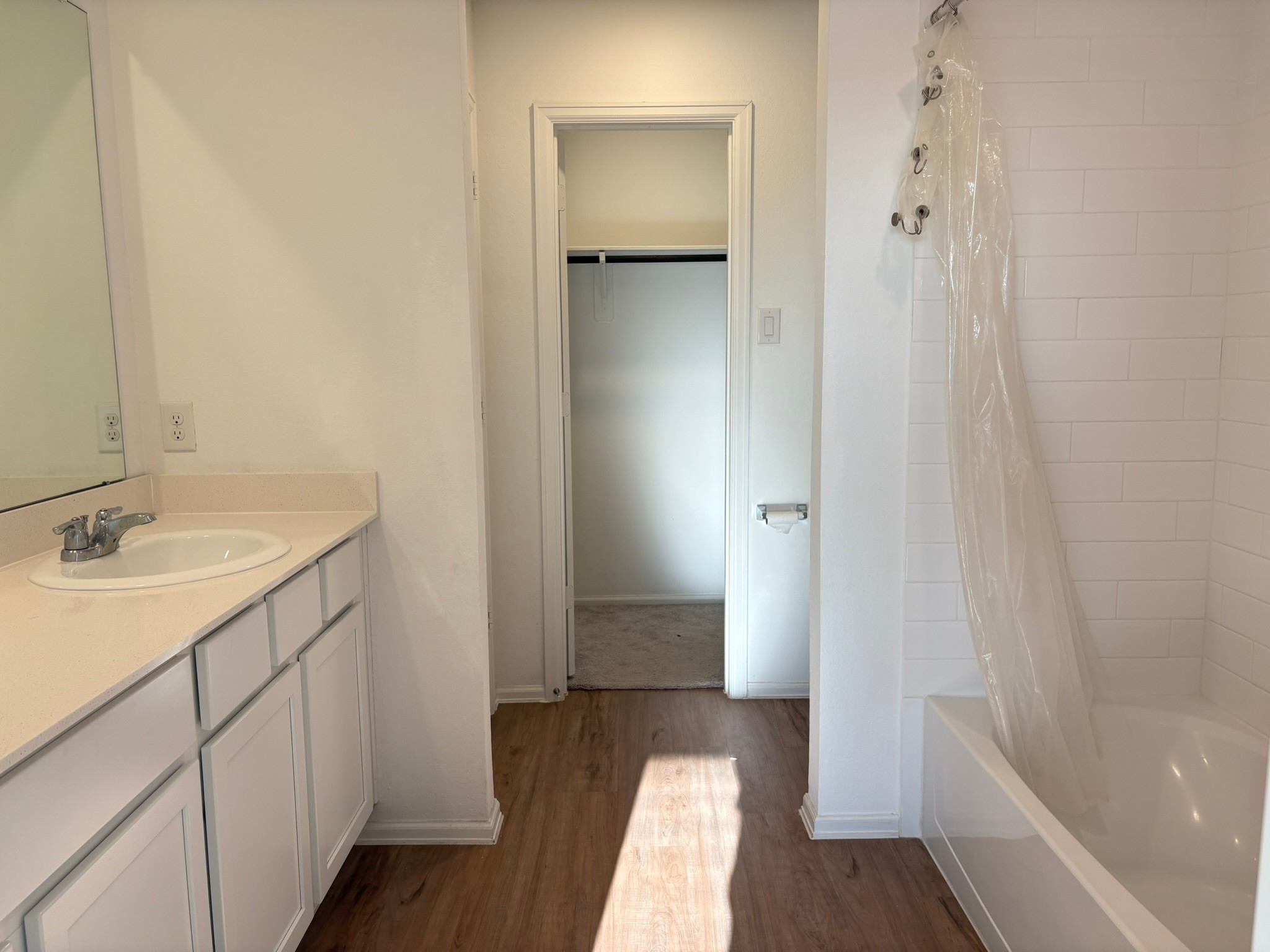 21911 Scopeto Lane New Caney, TX 77357 - Photo 10 of 14 a bathroom with a sink and a mirror