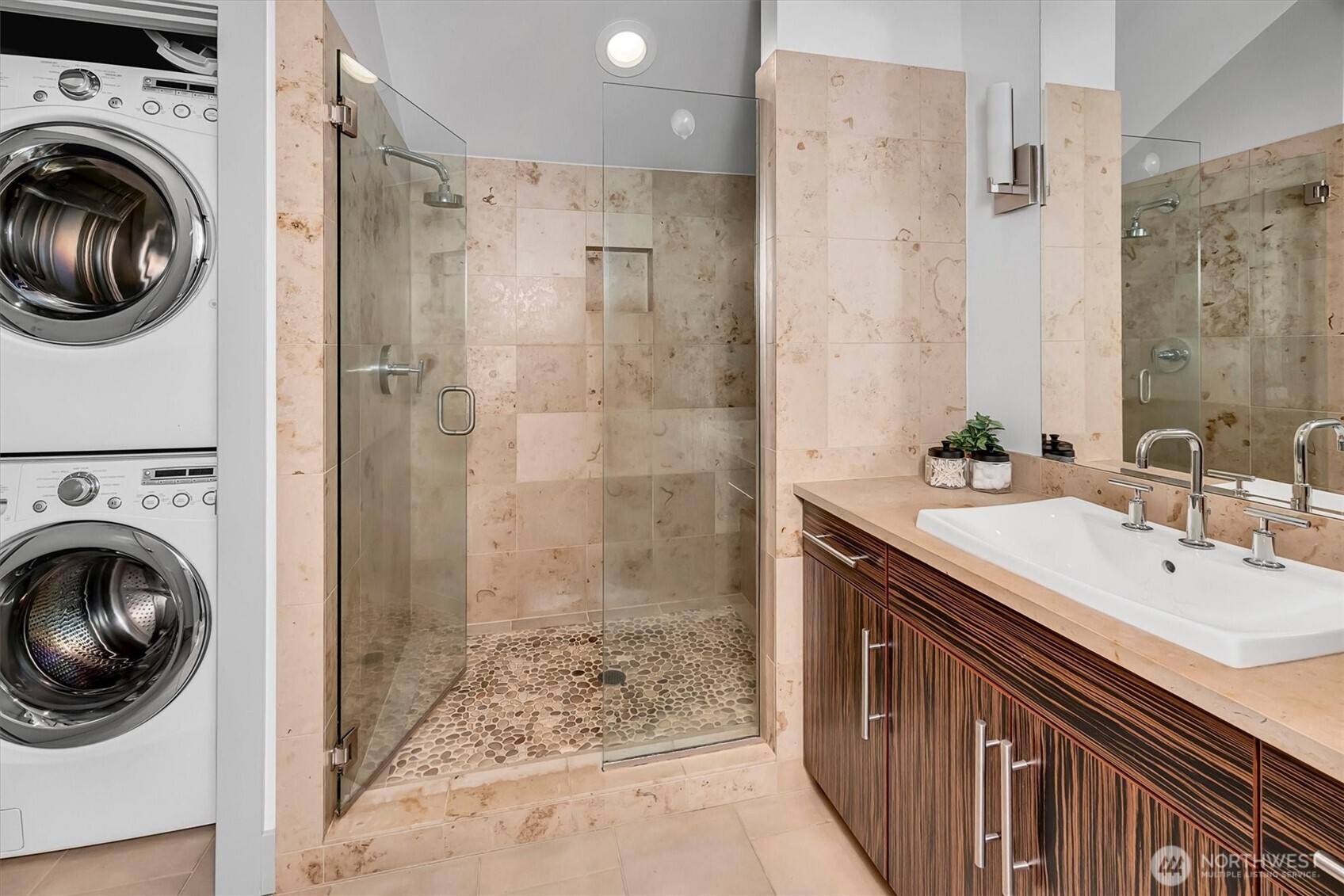 121 South Jackson Street, Unit 4 Seattle, WA 98104 - Photo 16 of 38 a bathroom with a sink a toilet and shower