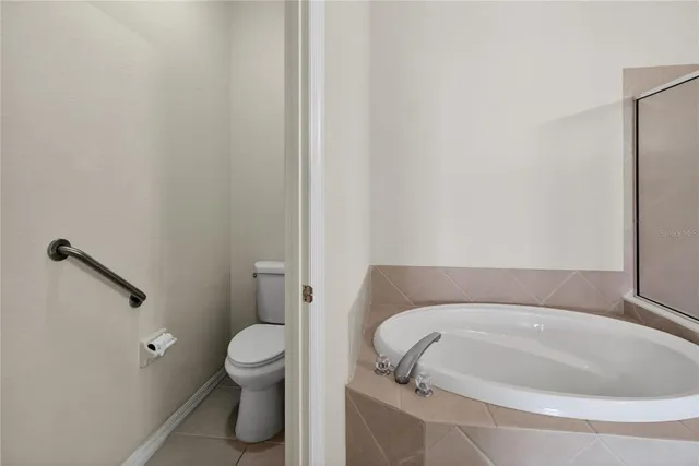 a bathroom with a double vanity sink and mirror