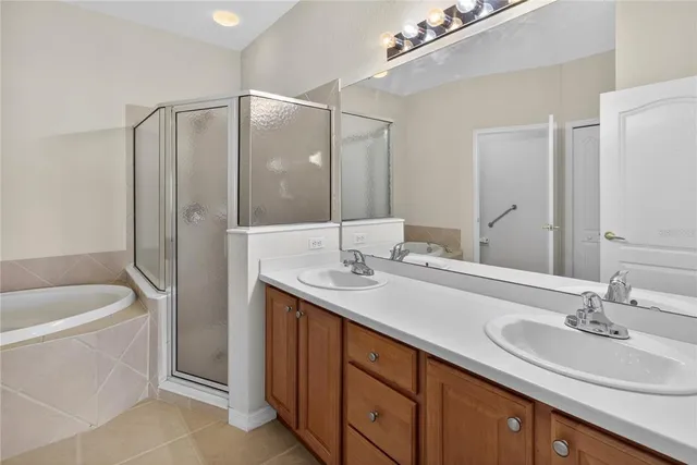 a white bath tub sitting in a bathroom
