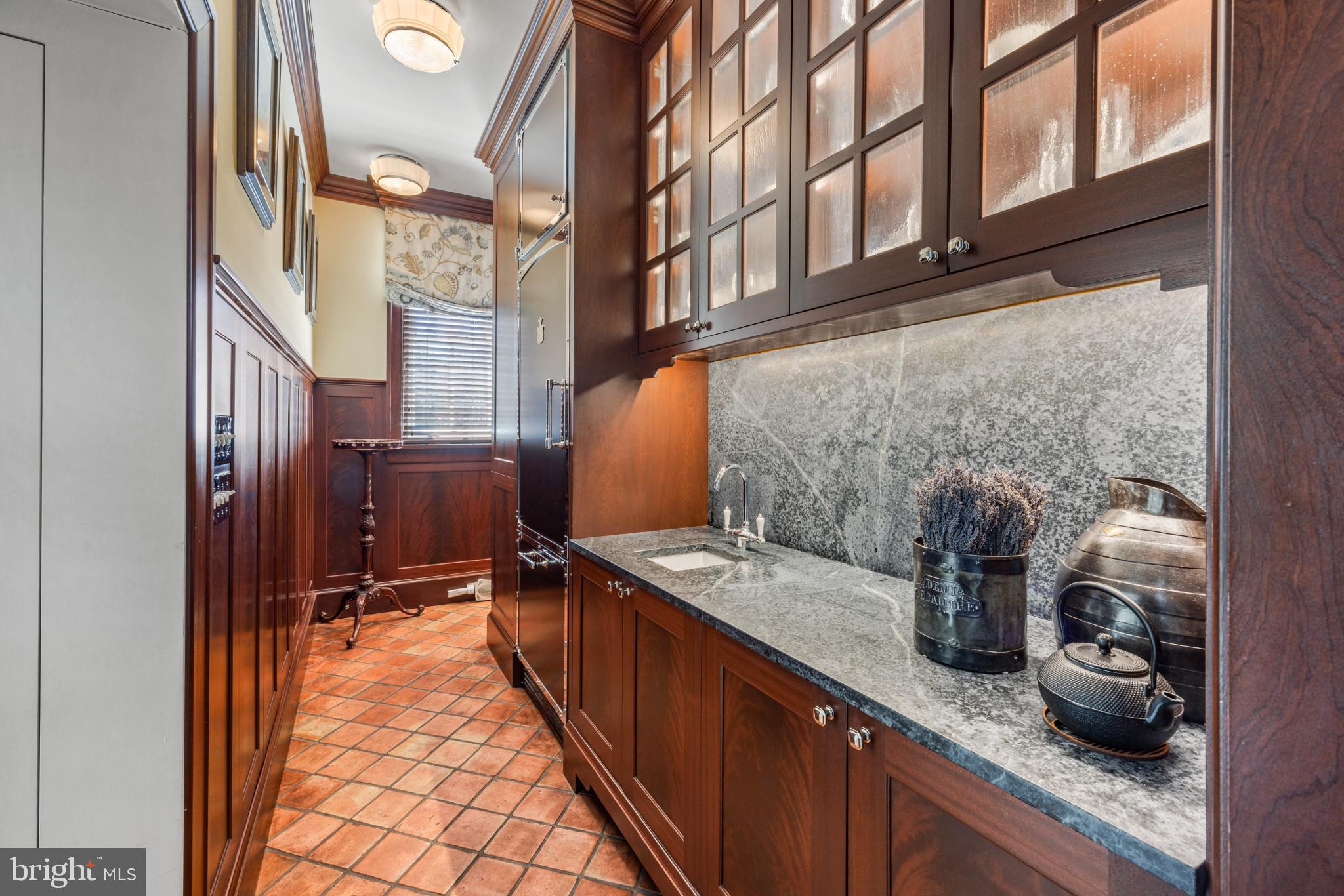 4102 Greenway Baltimore, MD 21218 - Photo 22 of 92 Custom mahogony cabinetry in pantry and kitchen