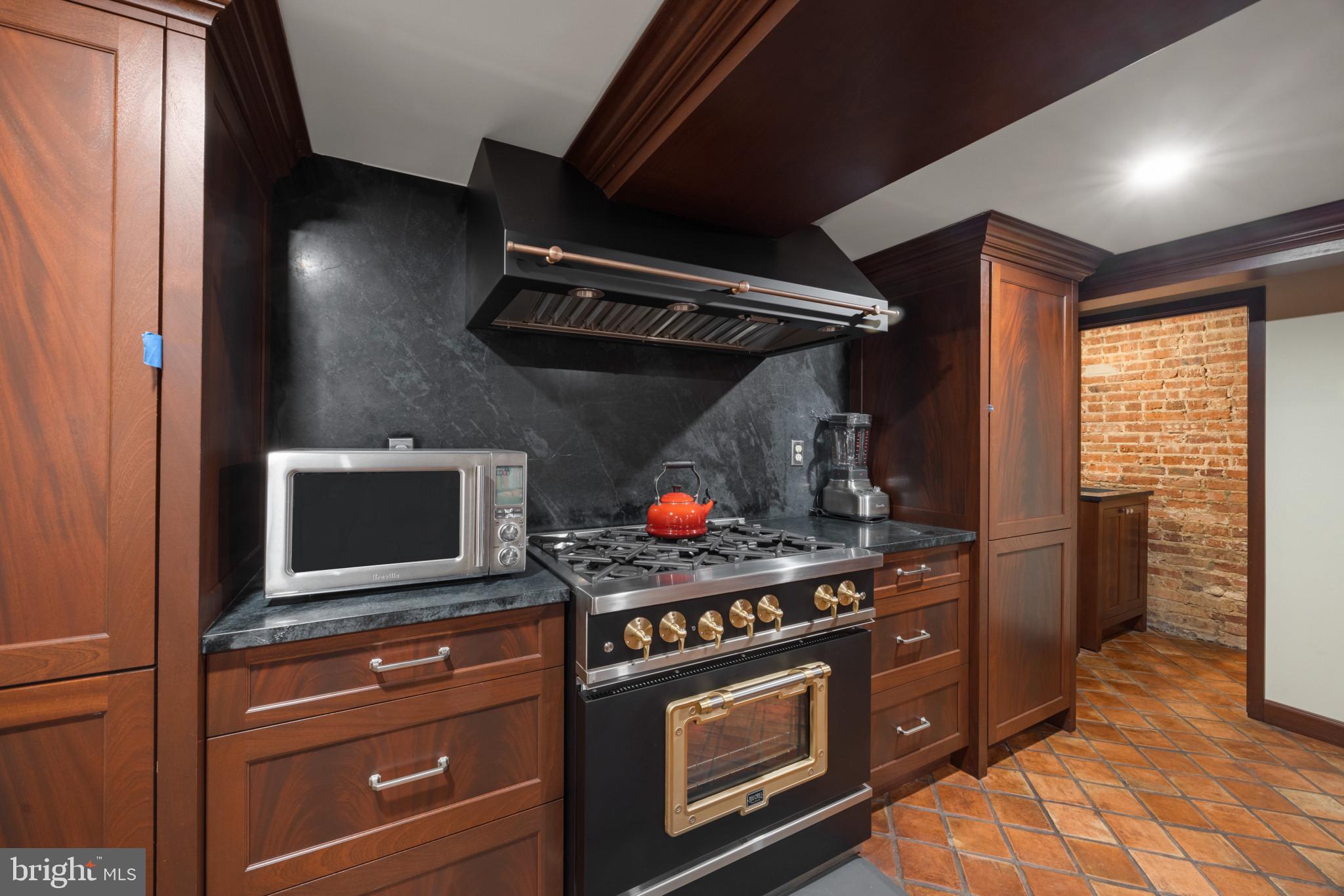 4102 Greenway Baltimore, MD 21218 - Photo 44 of 92 Custom lower level kitchen - gas stove