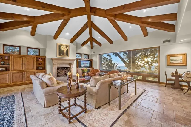 swimming pool view with a seating space