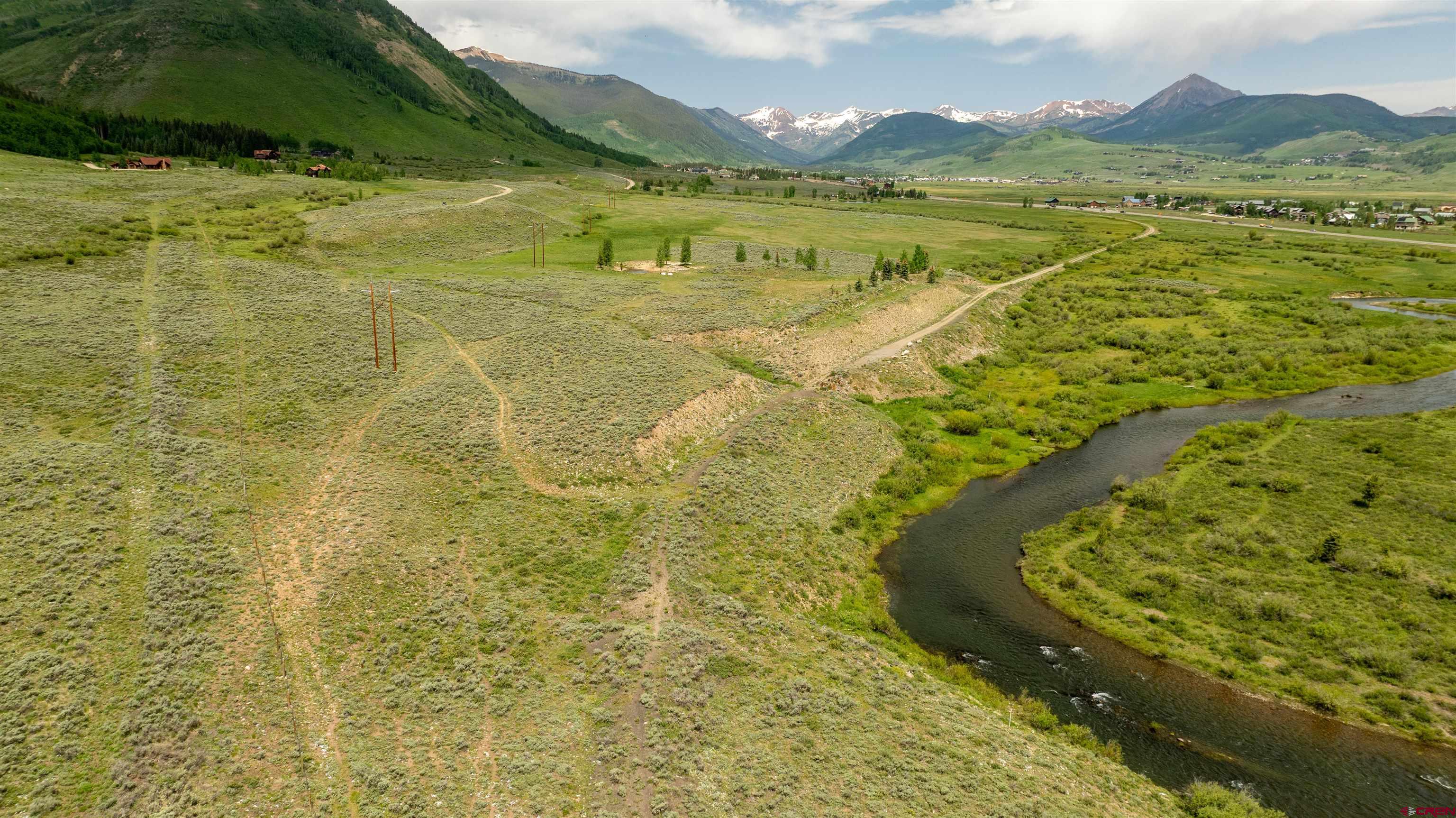 Tbd Tbd Hidden Mine Ranch Road Crested Butte, CO 81224 - Photo 5 of 19 a view of an ocean from a yard