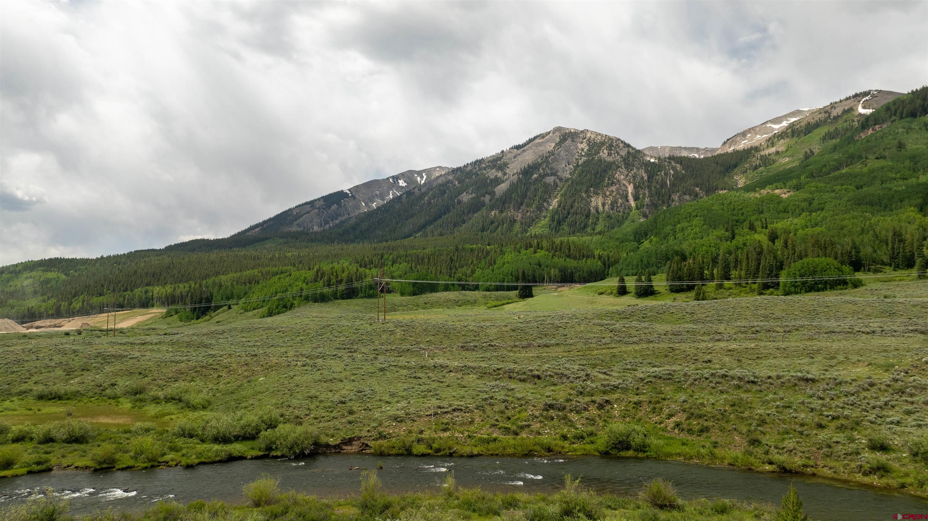 Tbd Tbd Hidden Mine Ranch Road Crested Butte, CO 81224 - Photo 8 of 19 a view of a town with mountains in the background