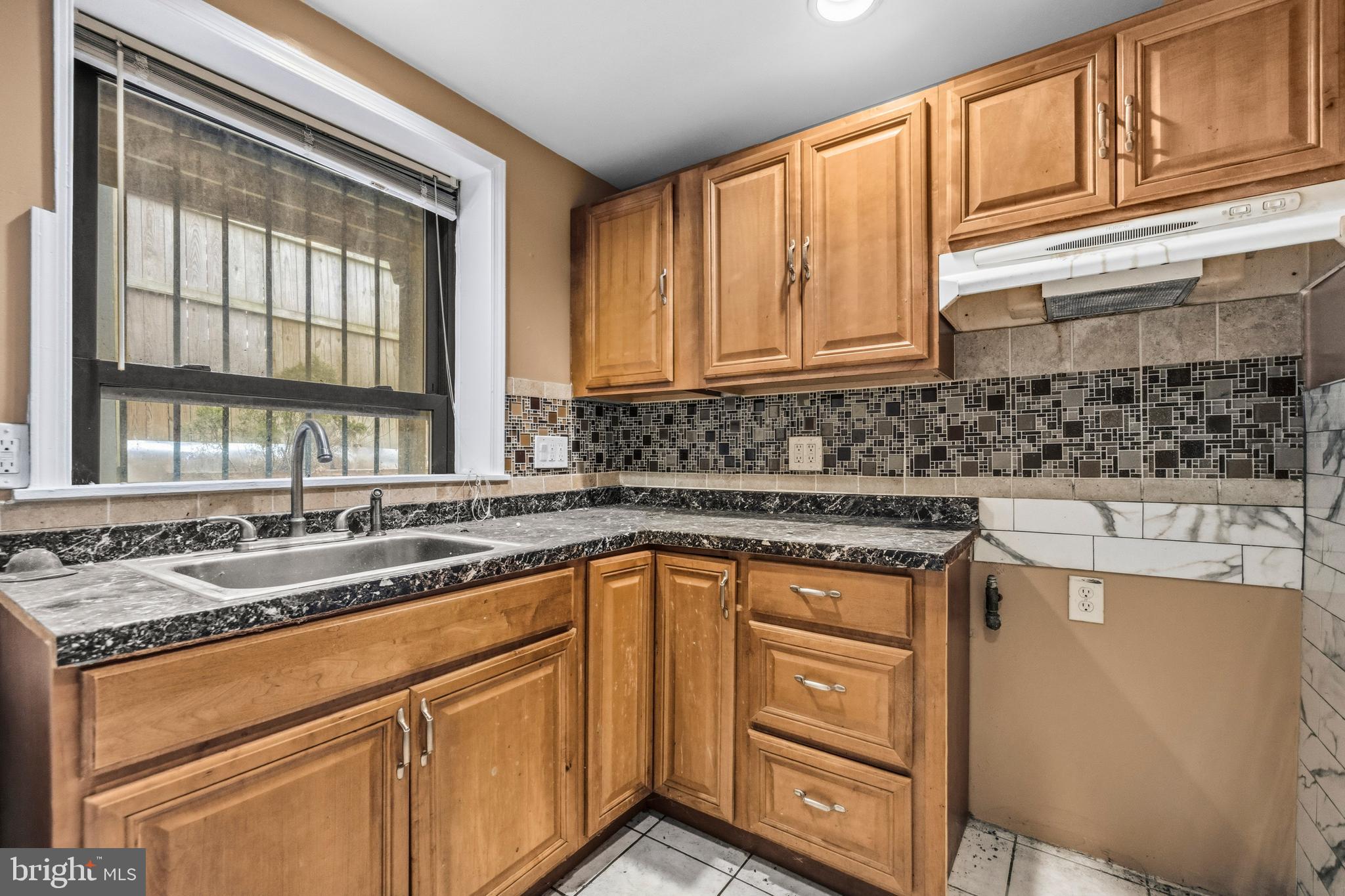 1920 11th Street Northwest Washington, DC 20001 - Photo 11 of 55 a kitchen with stainless steel appliances granite countertop a sink stove and cabinets