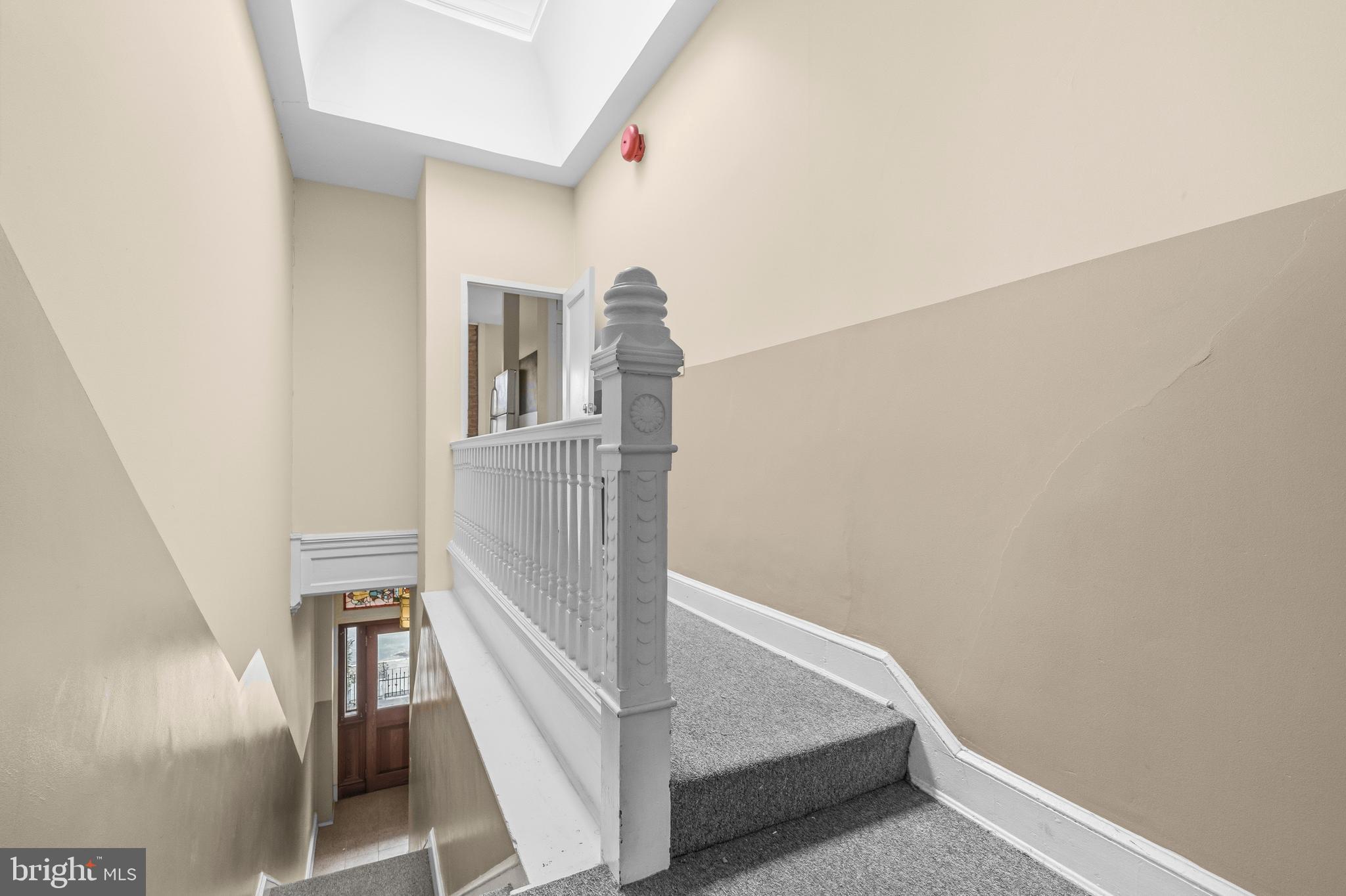 1920 11th Street Northwest Washington, DC 20001 - Photo 24 of 55 a view of staircase with railing and white walls