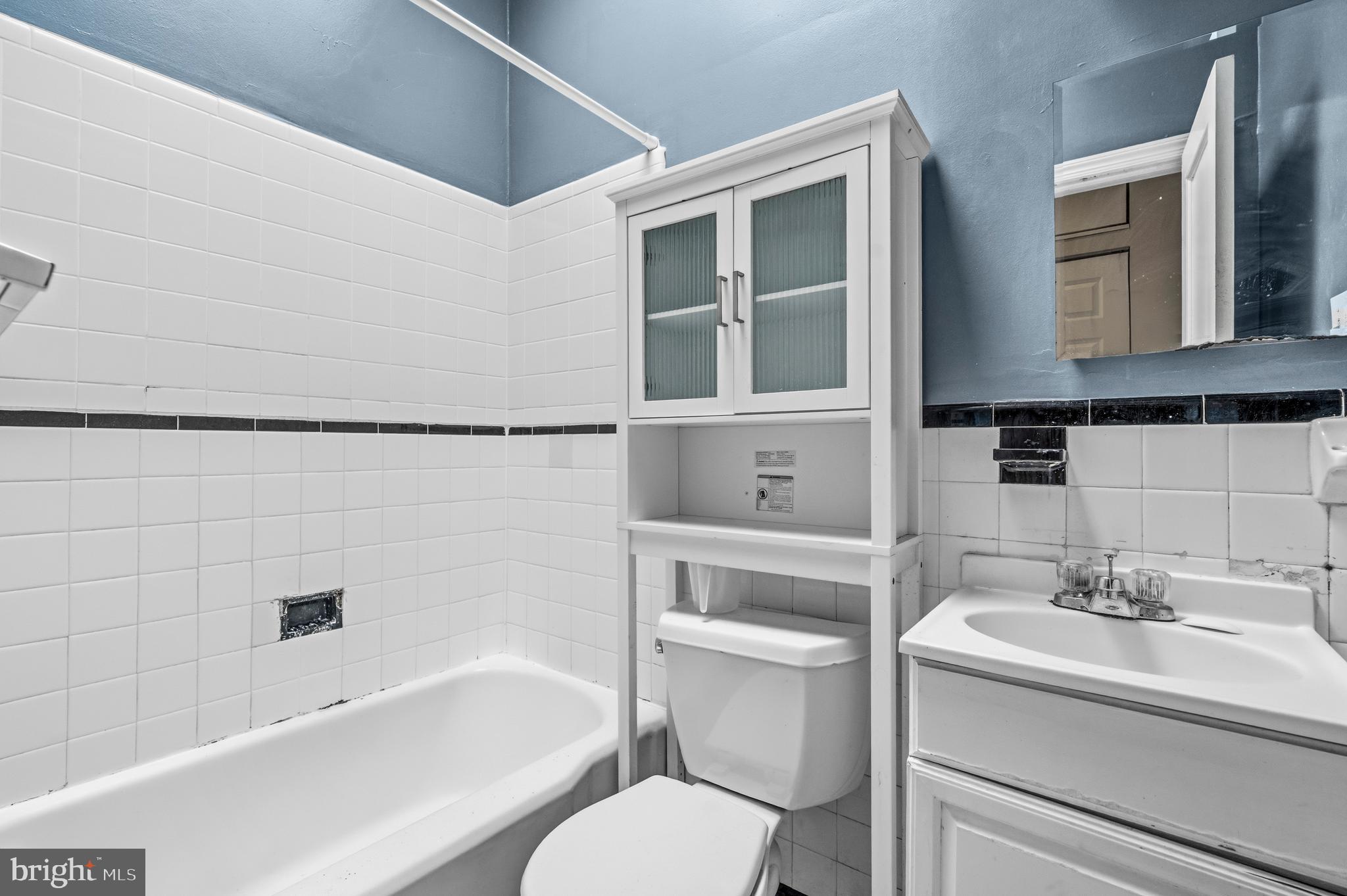 1920 11th Street Northwest Washington, DC 20001 - Photo 36 of 55 a bathroom with a sink toilet vanity and bathtub