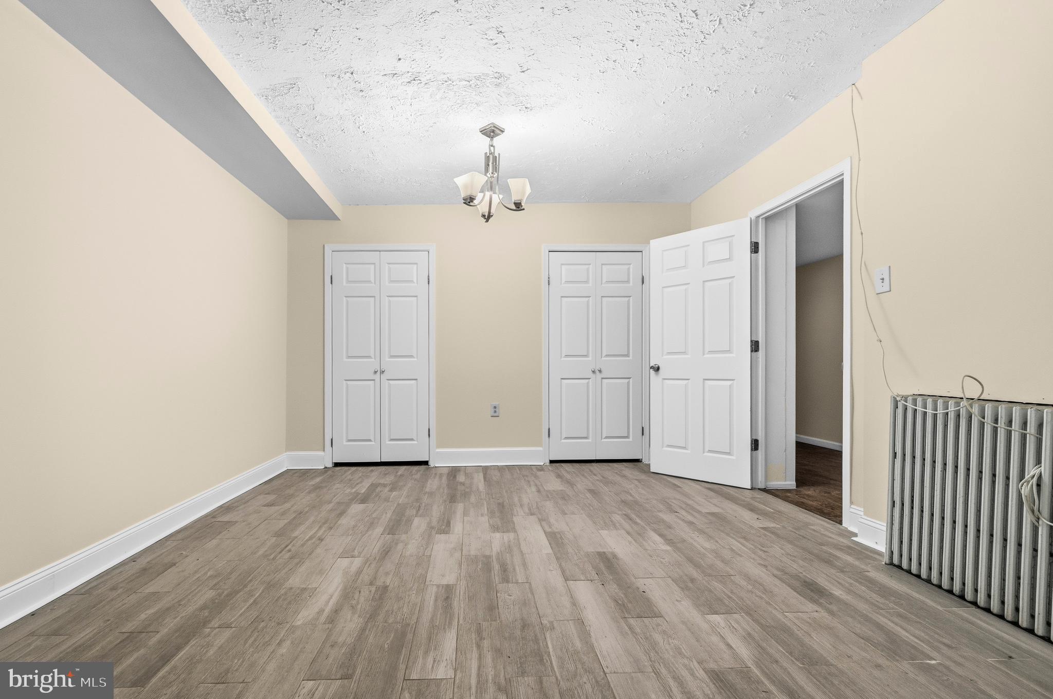 1920 11th Street Northwest Washington, DC 20001 - Photo 44 of 55 wooden floor in an empty room with a window