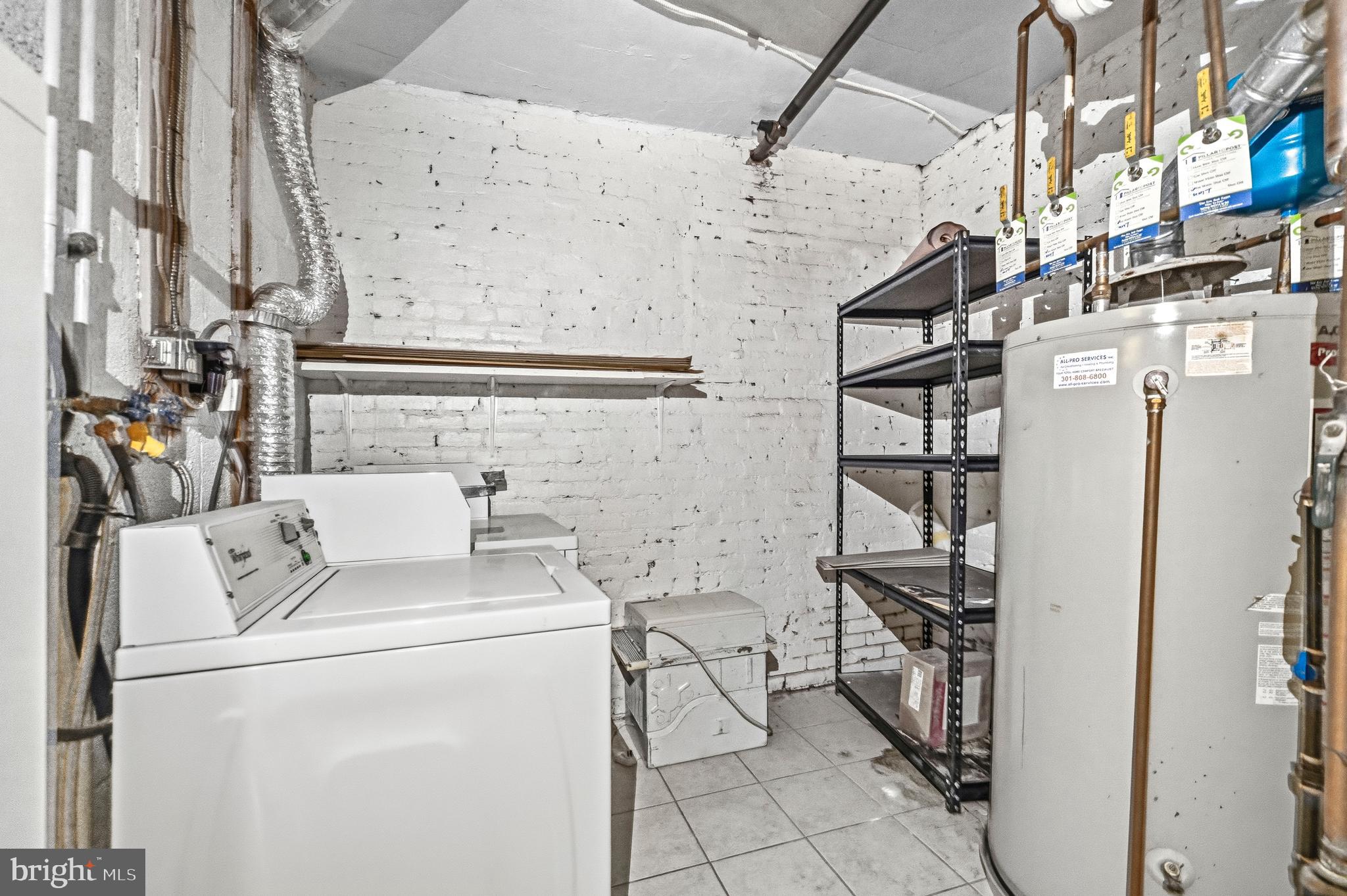 1920 11th Street Northwest Washington, DC 20001 - Photo 47 of 55 a utility room with dryer and washer