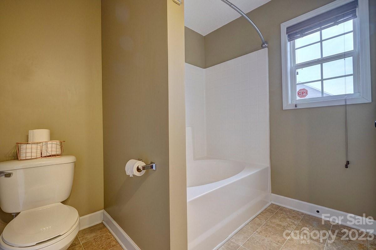 276 Springlake Road, Unit 6 York, SC 29745 - Photo 17 of 31 a bathroom with a toilet and a bathtub