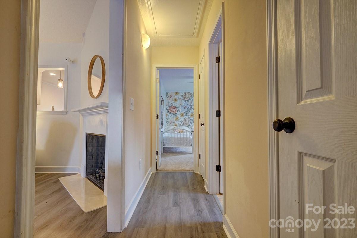 276 Springlake Road, Unit 6 York, SC 29745 - Photo 22 of 31 a view of a hallway with wooden floor and entryway
