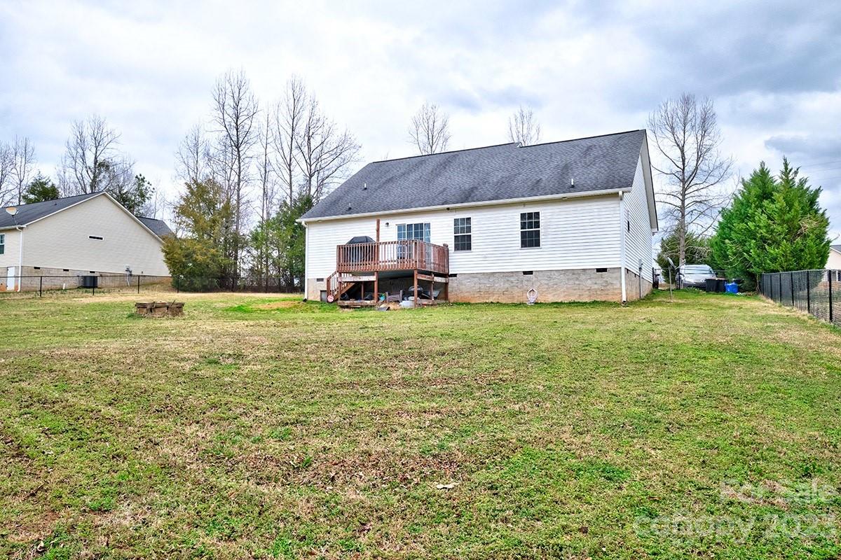276 Springlake Road, Unit 6 York, SC 29745 - Photo 27 of 31 a view of a house with a big yard and large tree