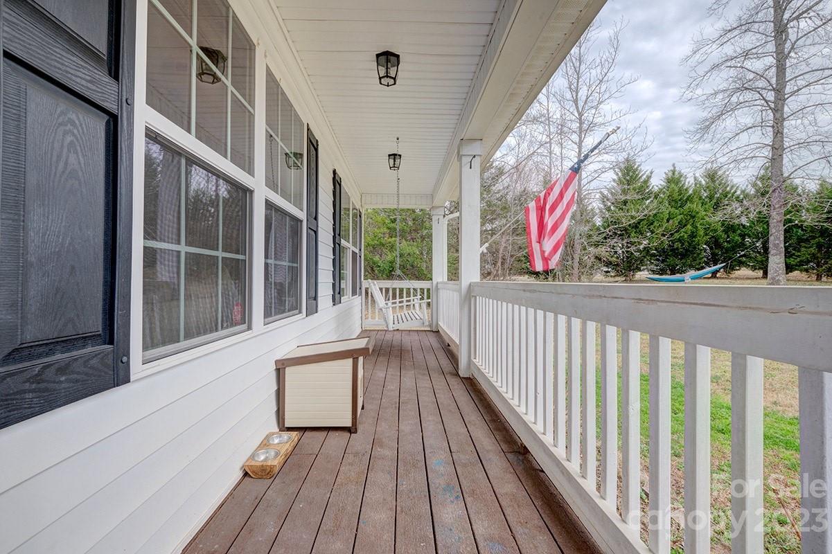 276 Springlake Road, Unit 6 York, SC 29745 - Photo 5 of 31 a view of a balcony with wooden floor and fence
