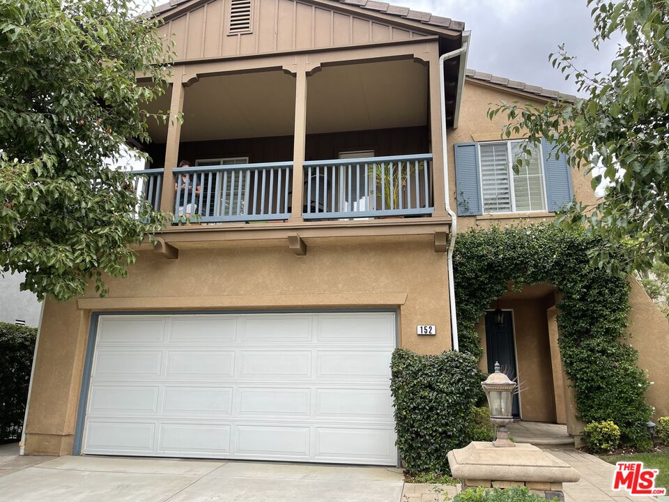 152 Park Hill Road Simi Valley, CA 93065 - Photo 1 of 16 a front view of a house with a yard